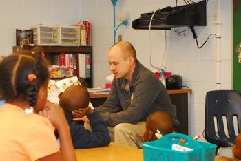 Ben Persons reading to a second grade class at Compton Elementary